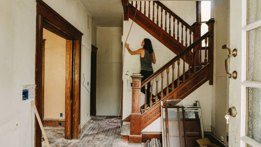 A woman starting renovation work, thanks to her home equity loan for remodel.