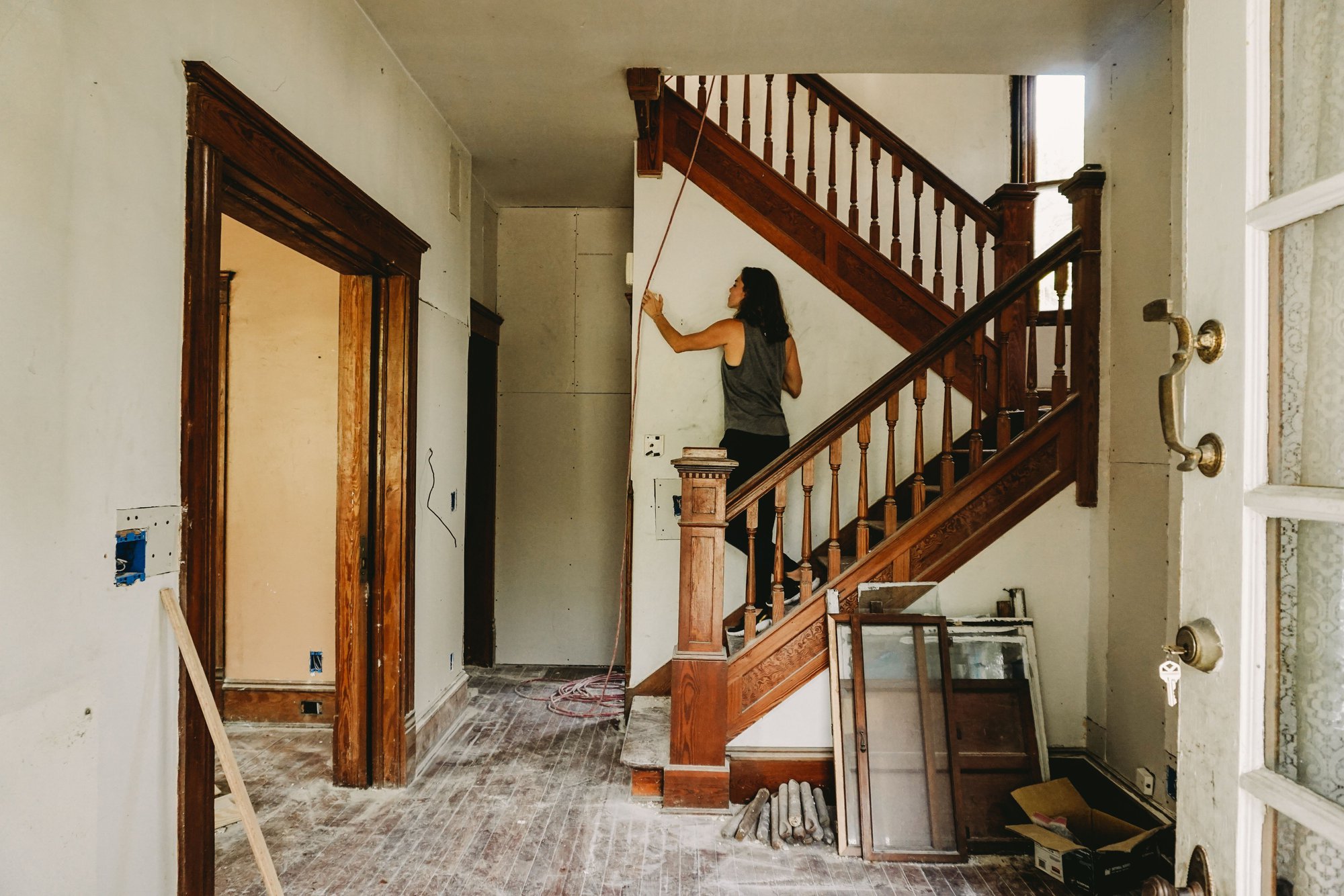 A woman starting renovation work, thanks to her home equity loan for remodel.